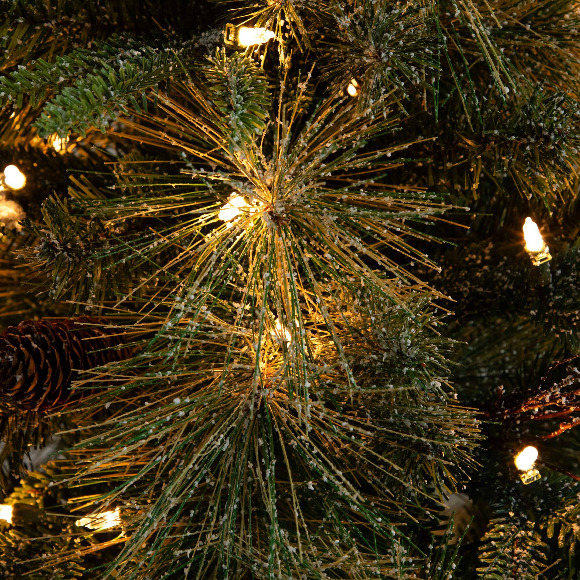 4ft. Pre-Lit Mixed Pine Snowed Artificial Christmas Tree with Pinecones in Decorative Planter, Warm White LED Lights
